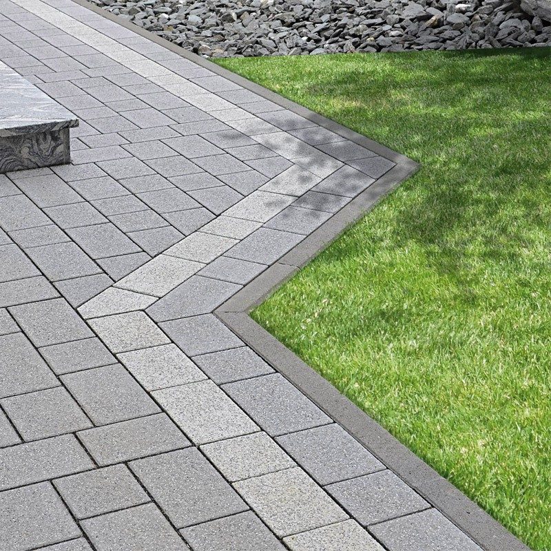 Semmelrock® K SZEGÉLY 25/25/15-10 CM SZÜRKE